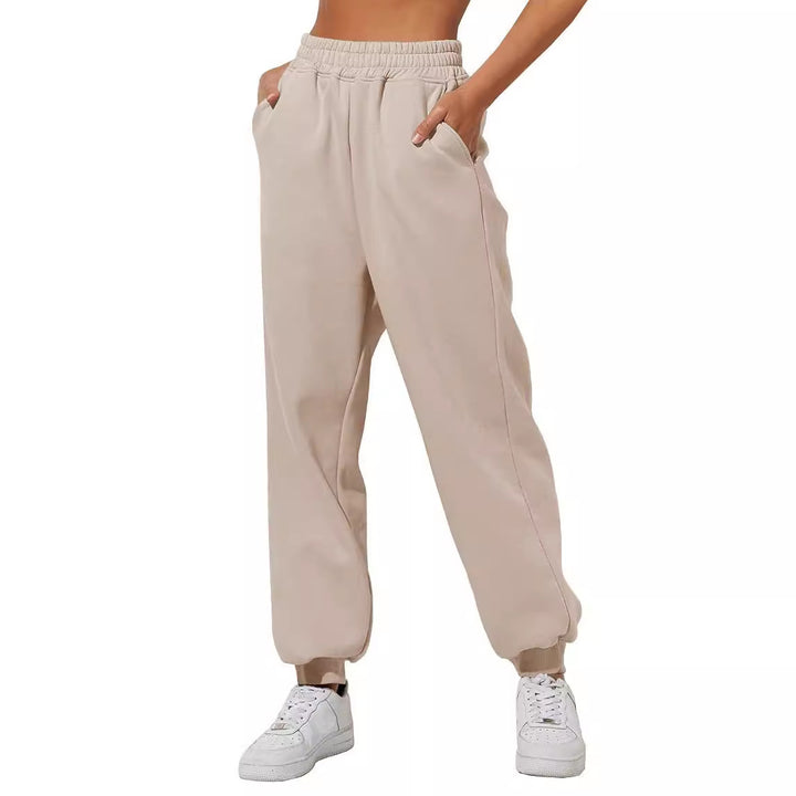 Women's relaxed high-waist jogging pants with double-layer comfort waistband, side pockets, and gathered ankle cuffs Mune Fashion
