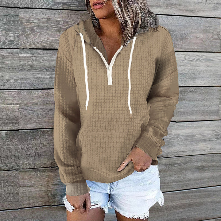 Women's waffle texture hoodie with half zip, kangaroo pocket, and casual oversized cut Mune Fashion