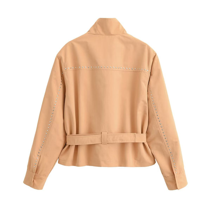Ladies short jacket with studded details, stand-up collar and waist belt Mune Fashion