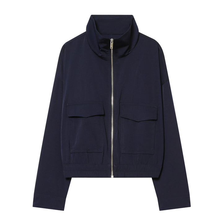 Women's short utility blouson jacket with standing collar, patch chest pockets, full zip, and elastic hem Mune Fashion