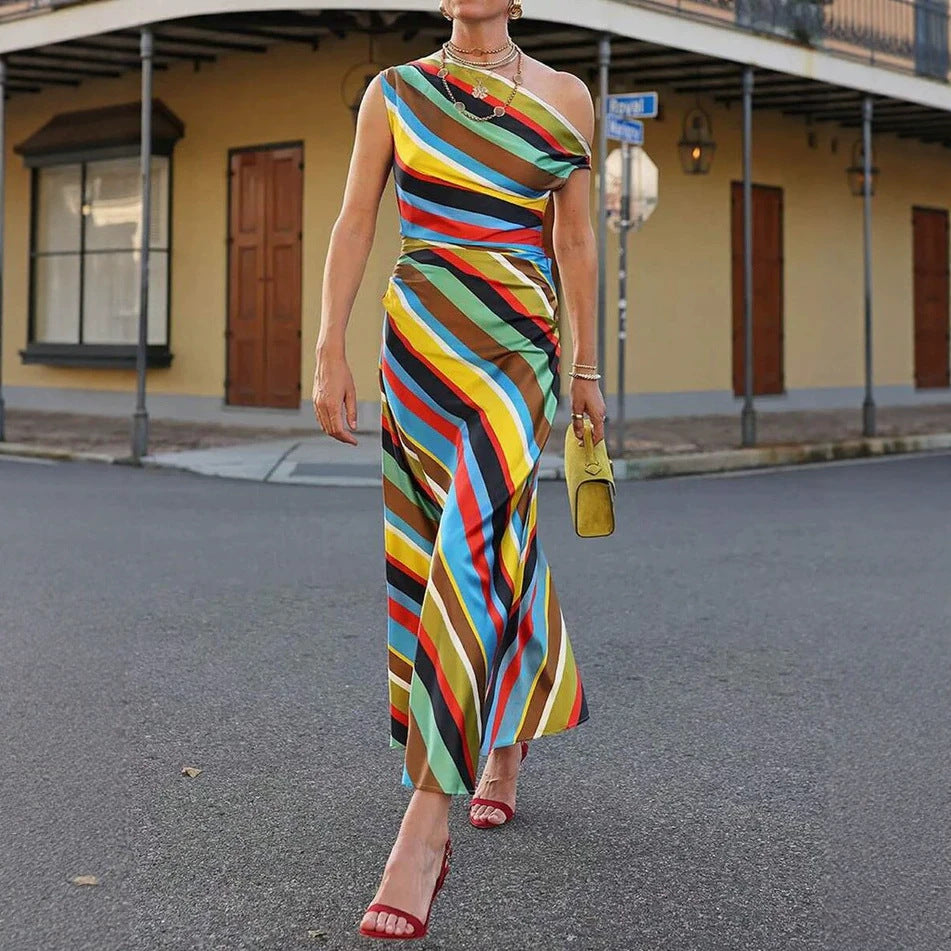 Women's asymmetrical off-shoulder maxi dress with diagonal stripe pattern and fitted silhouette Mune Fashion