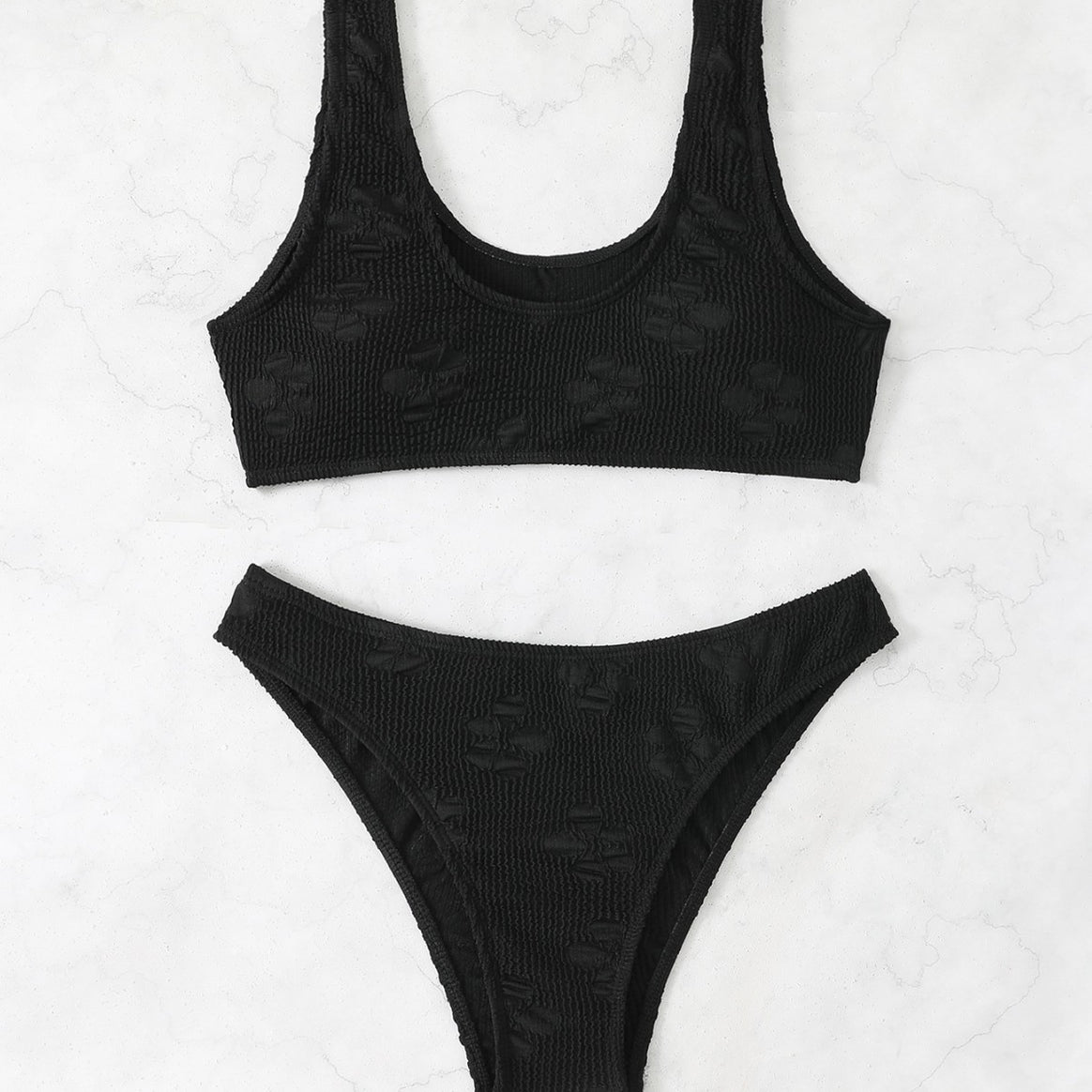 Women's bikini set with textured surface and deep neckline Mune Fashion