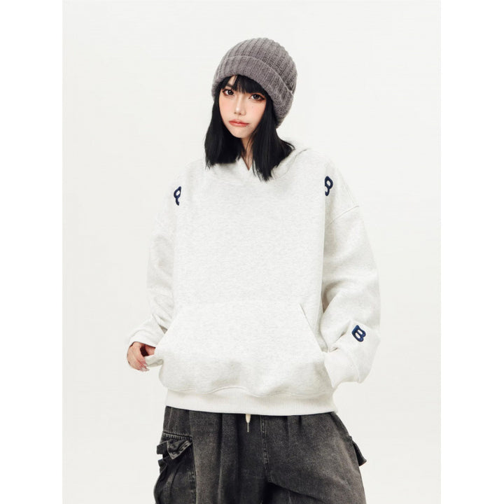 Unisex Oversized Hoodie with large intarsia block print and ribbed hem Mune Fashion
