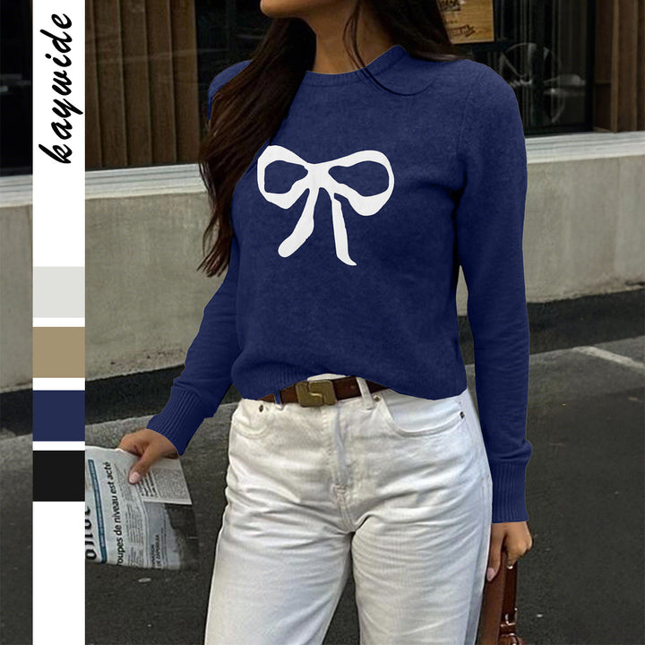 Women's fine knit pullover with large bow print, round neckline and slim fit Mune Fashion