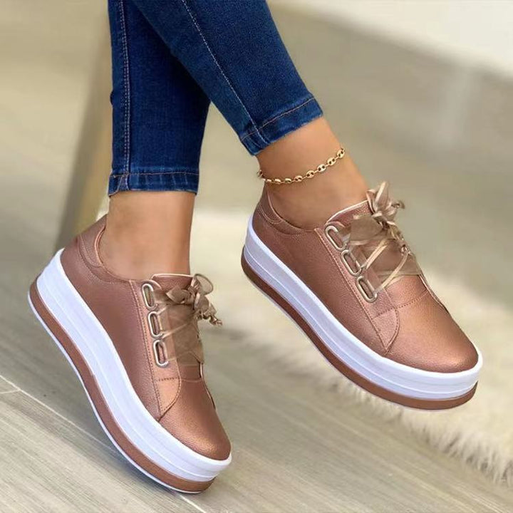 Women's platform sneakers with textured synthetic leather upper and extra high rubber platform Mune Fashion