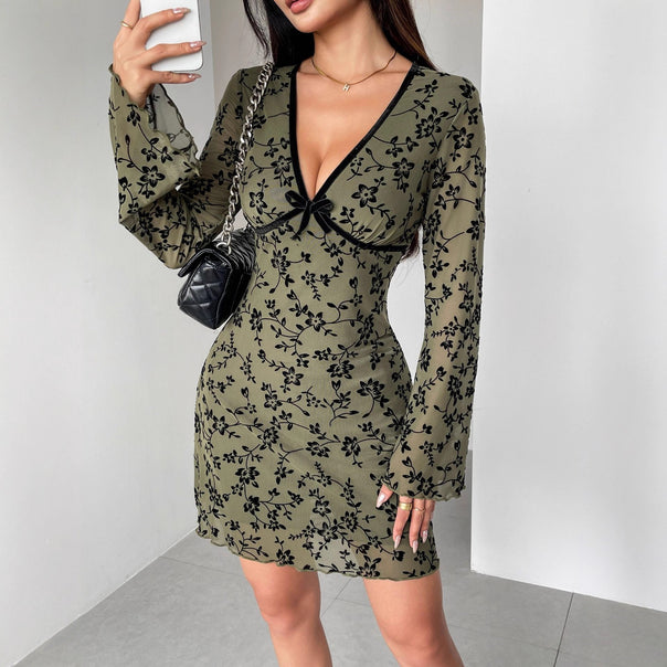 Women's fitted mesh mini dress with velvet flock floral pattern, deep V-neckline and bow appliqué Mune Fashion
