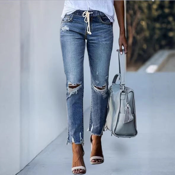 Women Cropped Denim Jeans with Drawstring Waistband, Destroyed Knee Areas and Raw Hem Mune Fashion