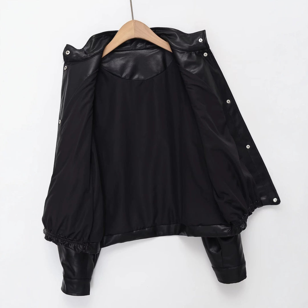 Women's short PU leather bomber jacket with stand-up collar, snap button placket, and elastic hem Mune Fashion
