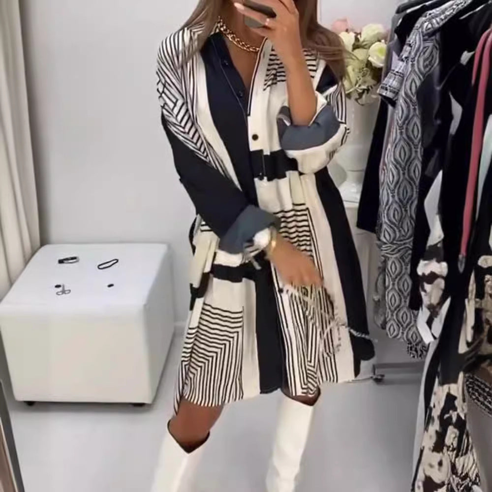 Women's knee-length A-line shirt dress with graphic line print, concealed button placket, and oversized cuffs Mune Fashion