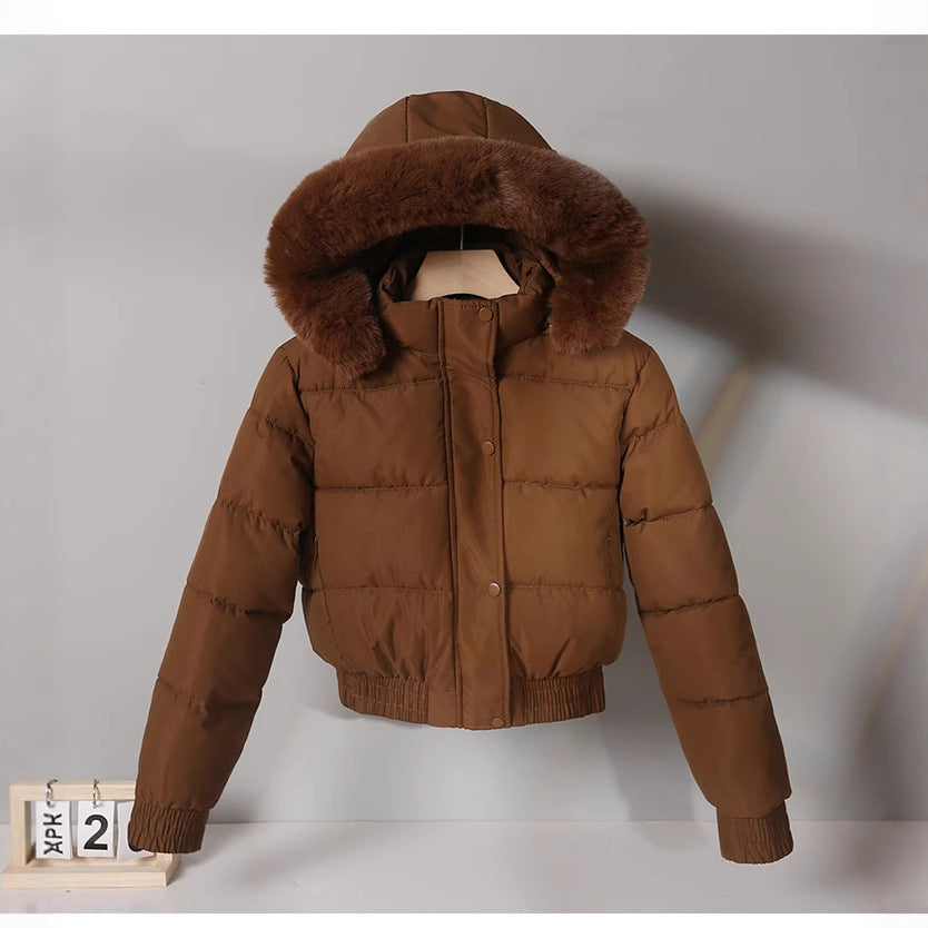 Ladies' short padded hooded jacket with faux fur trim, elastic hem, and concealed zipper Mune Fashion