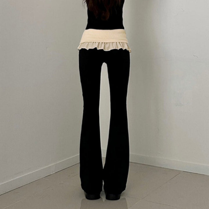 Women's tailored high-waist flared pants with decorative tape, belt loops, and flared leg Mune Fashion