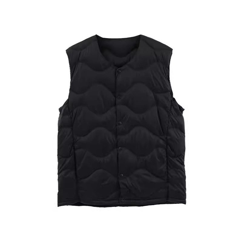 Women’s sleeveless thermal quilted vest with wave-shaped quilting and snap button closure Mune Fashion