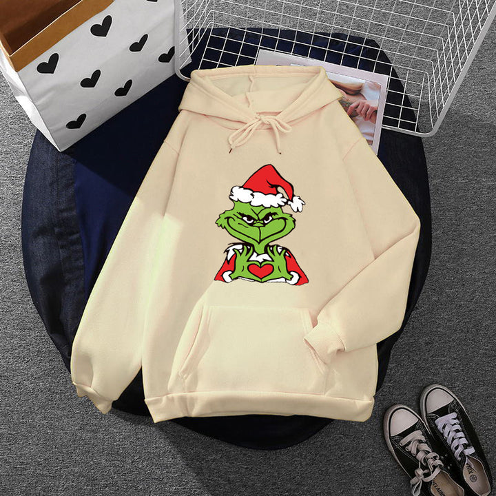 Unisex hoodie with soft fleece lining, kangaroo pocket and eye-catching Christmas comic print Mune Fashion