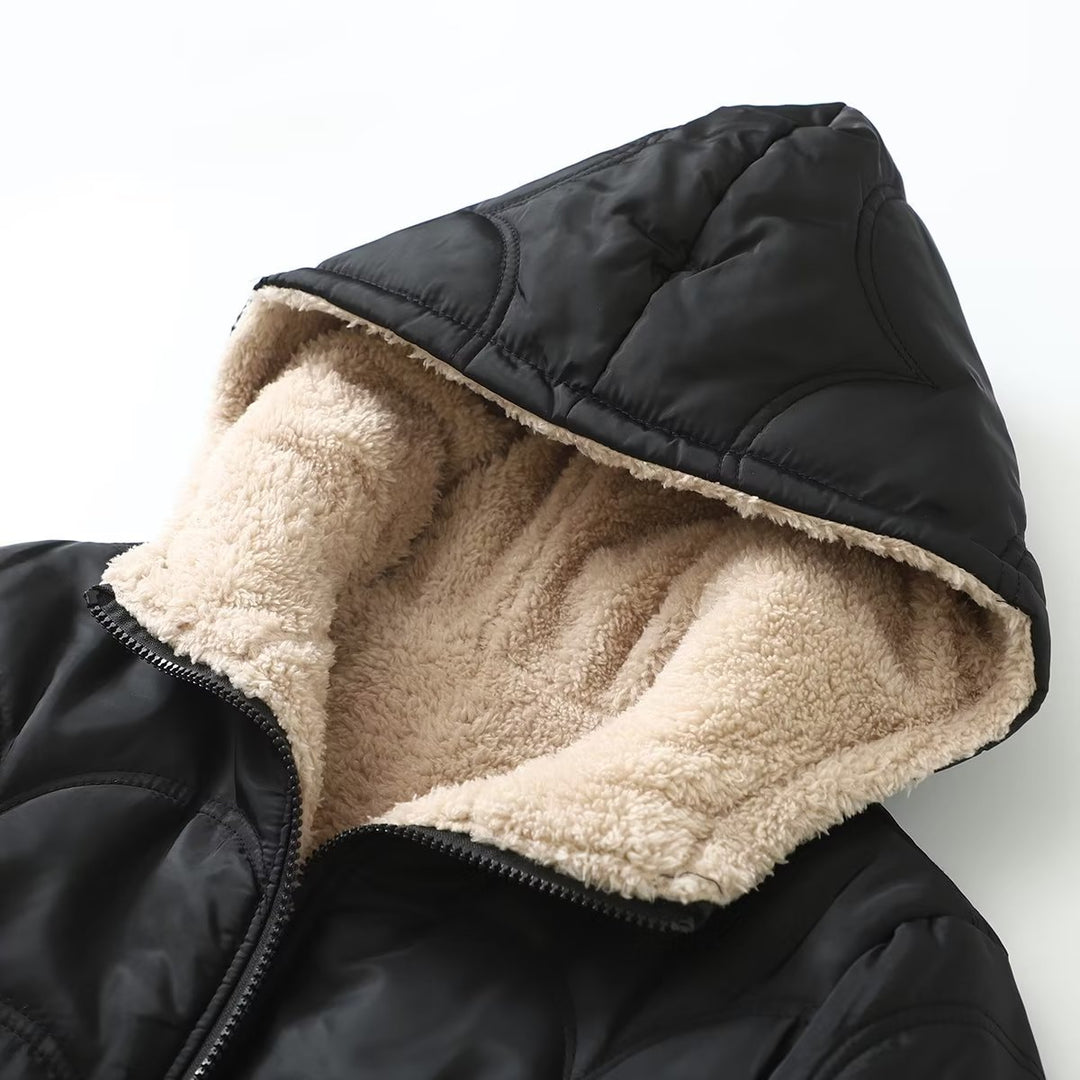 Ladies' quilted hooded jacket with teddy lining, full zipper and side pockets Mune Fashion