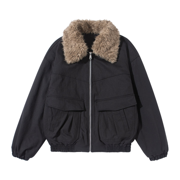 Women's short jacket with voluminous faux fur collar, kangaroo pockets, and elastic hem Mune Fashion