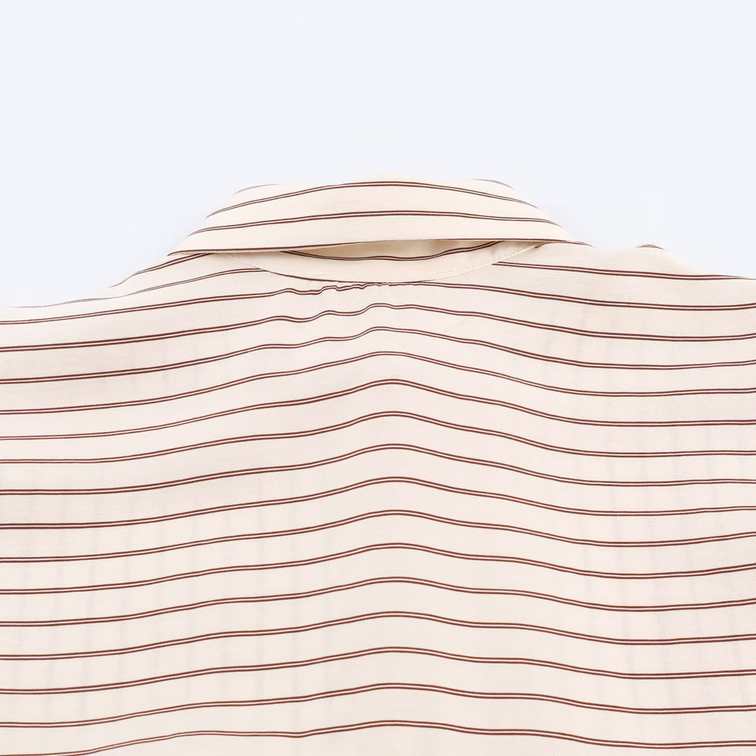 Women’s oversized blouse with stripe pattern, extended cuffs and concealed button placket Mune Fashion