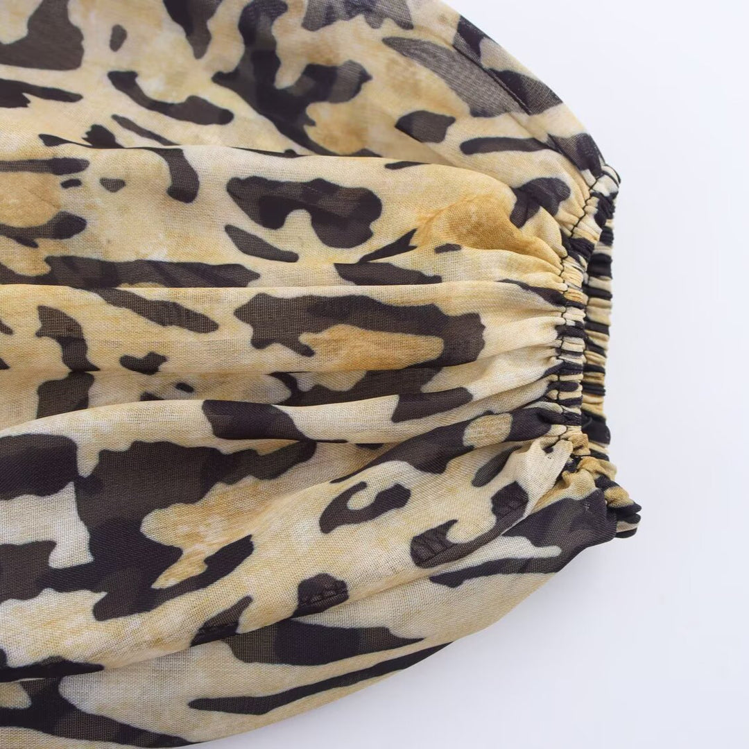 Ladies Asymmetric Wrap Blouse with Leopard Print, V-Neck, Balloon Sleeves, and Waistbelt Mune Fashion