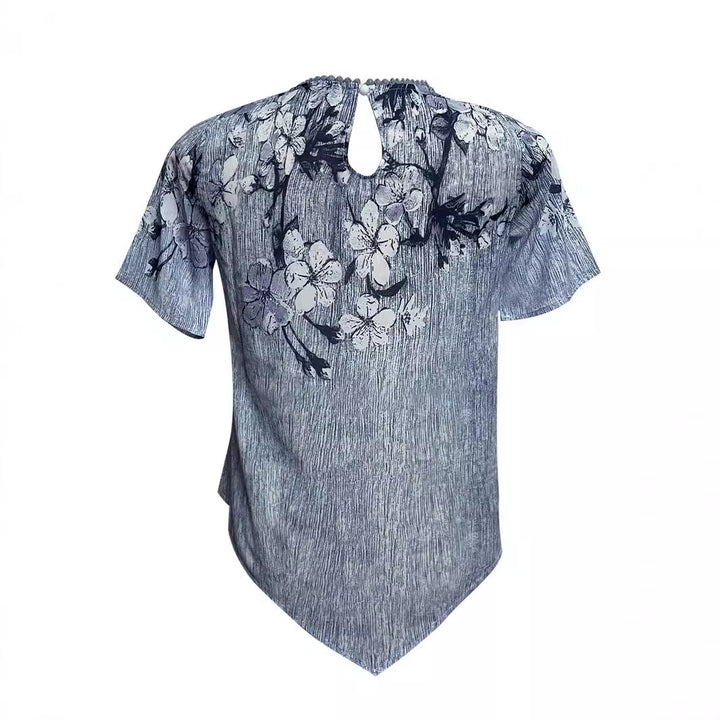 Women's two-layer blouse dress with asymmetrical tiered hem, floral print yoke, and wing sleeves Mune Fashion