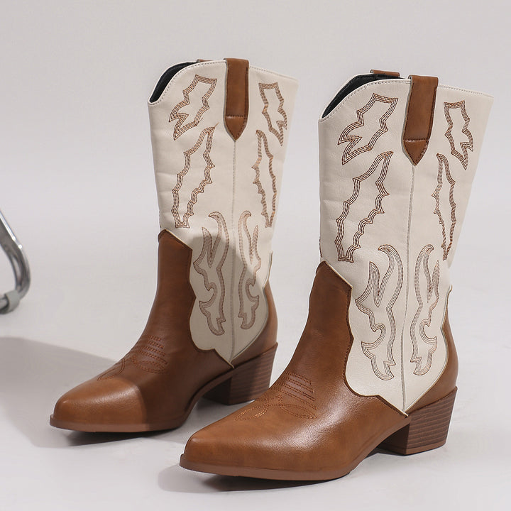 Women's cowgirl boots in western style with mid-high block heel, pointed toe cap, and decorative embroidery Mune Fashion