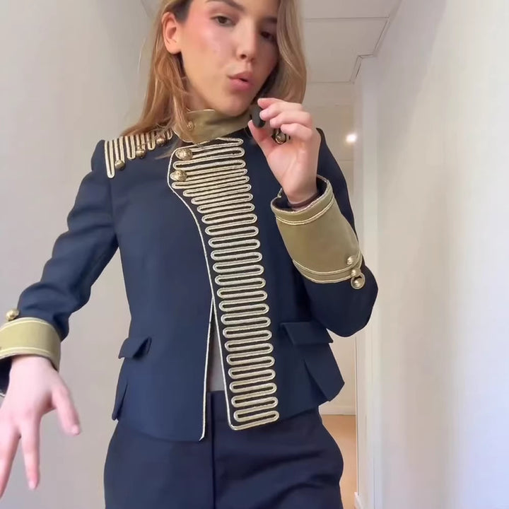Women’s military-inspired short jacket with gold cord trim and stand-up collar Mune Fashion