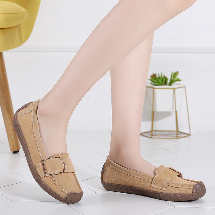 Women's moccasin slippers made of suede leather with decorative metal buckle, padded footbed, and non-slip rubber outsole Mune Fashion