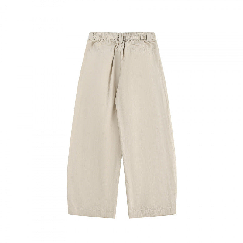 Women's wide high-waisted culotte pants with pleats, elastic waistband, and side pockets Mune Fashion