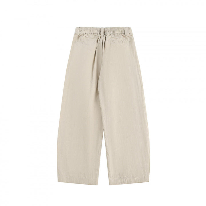 Women's wide high-waisted culotte pants with pleats, elastic waistband, and side pockets Mune Fashion