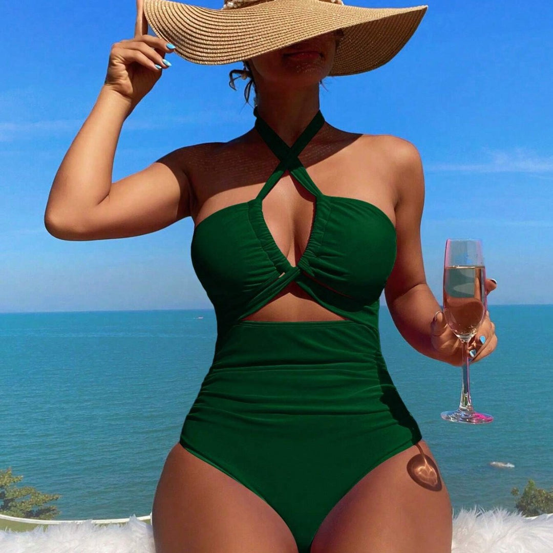 Women's one-piece swimsuit with innovative cut-out design and playful bow band Mune Fashion