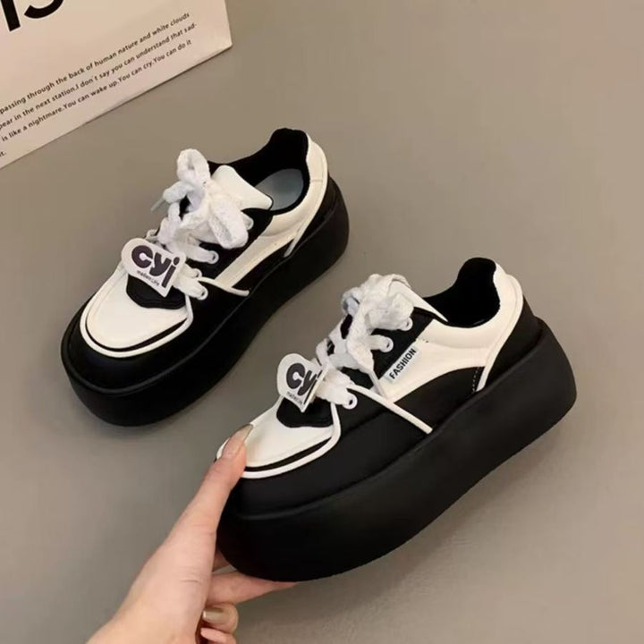 Ladies fashionable platform sneakers with elegant decorative seams and cushioned sole Mune Fashion