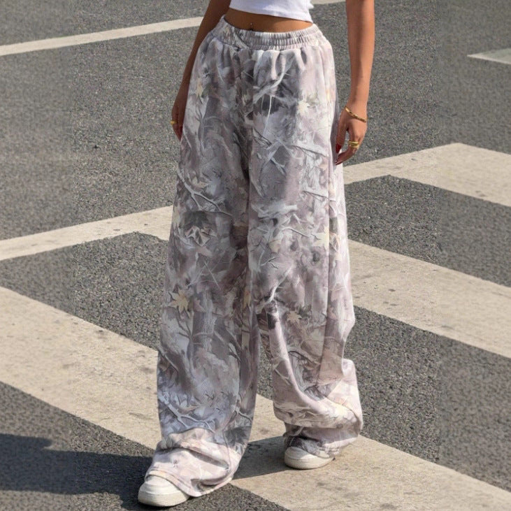 Women's wide Palazzo pants with floral all-over print and elastic waistband Mune Fashion