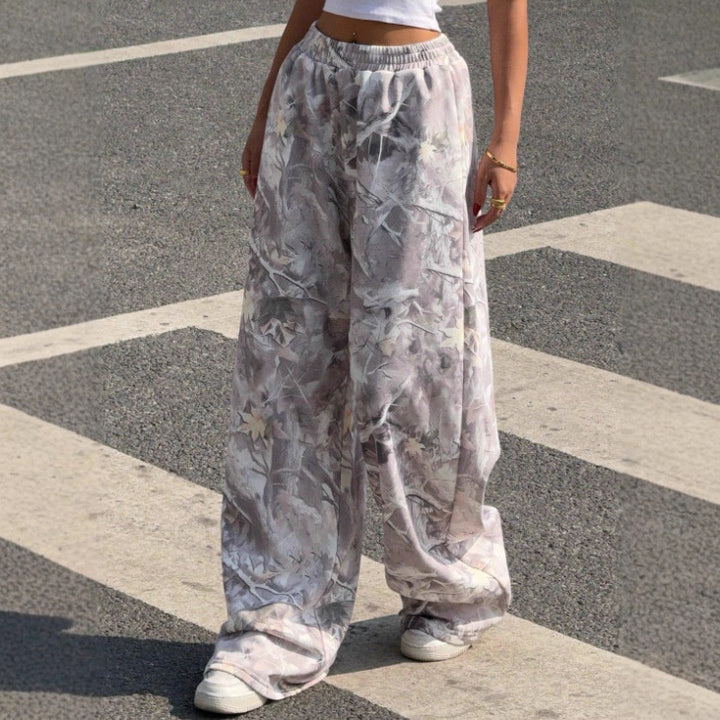 Women's wide Palazzo pants with floral all-over print and elastic waistband Mune Fashion