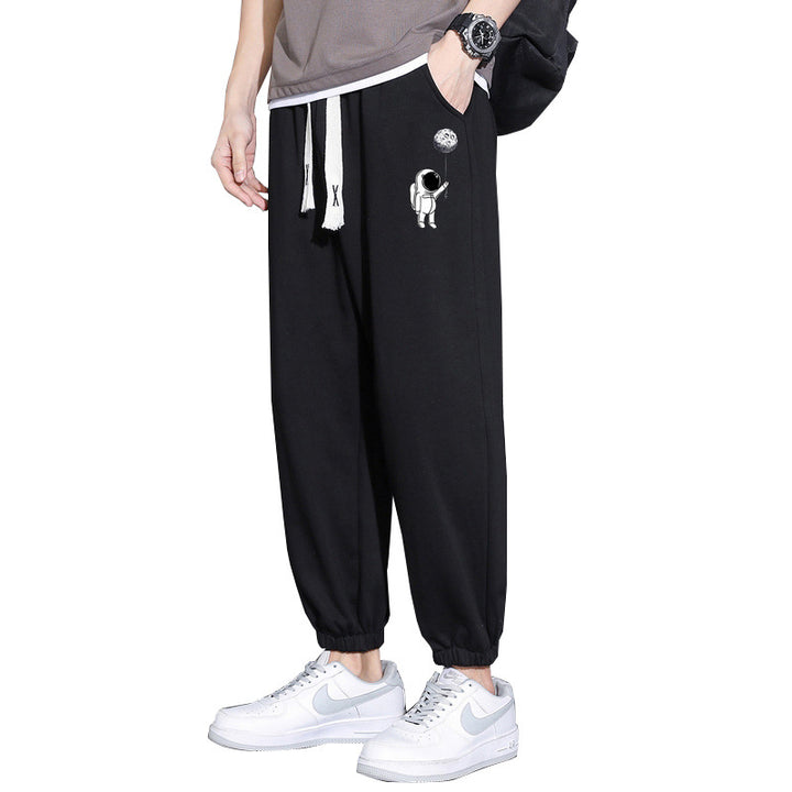 Men's Loose Jogging Pants with Astronaut Print, Drawstring Waistband and Elastic Cuffs Mune Fashion