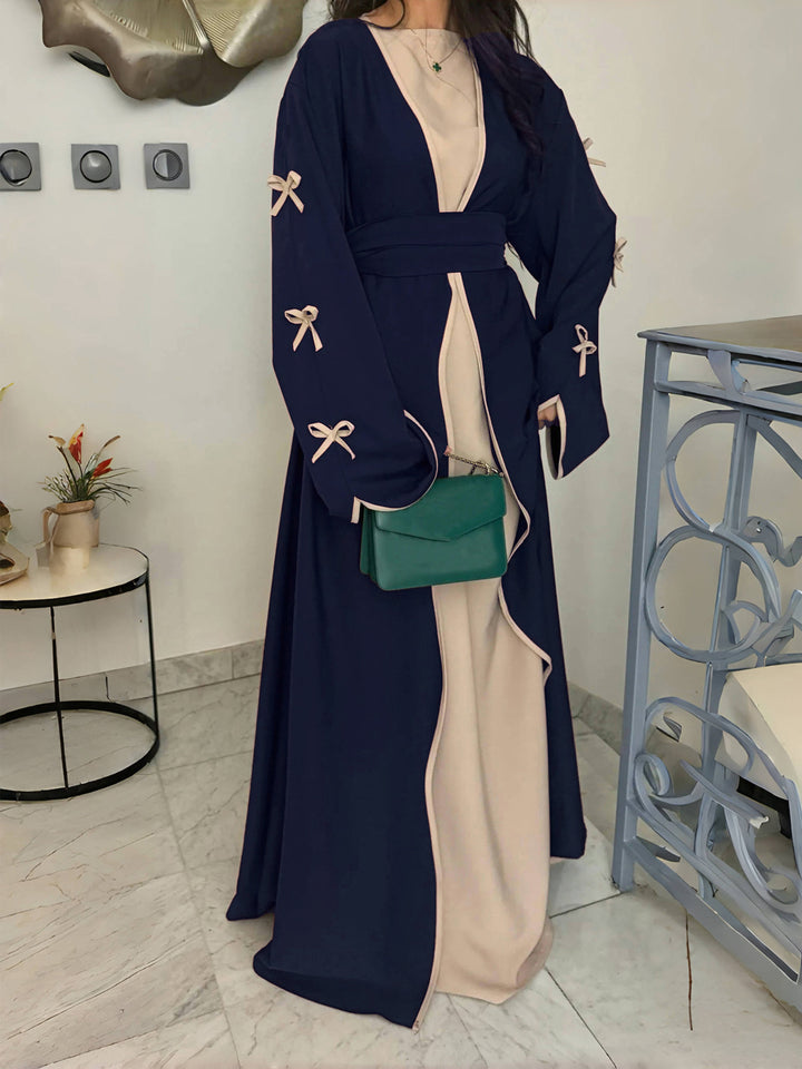 Women's elegant Abaya-Kaftan with wide trumpet sleeves, contrasting yoke and wrap belt Mune Fashion