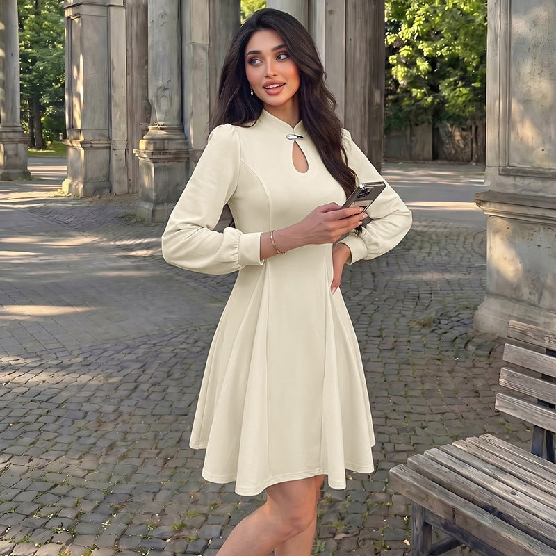 Women's elegant fitted skater dress with stand-up collar, keyhole detail & long balloon sleeves Mune Fashion