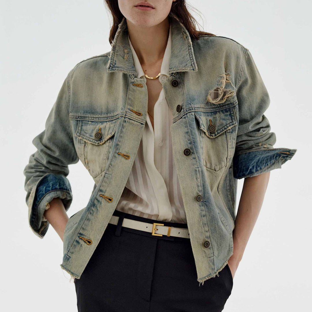 Women’s oversized destroyed denim jacket with raw hem, patch chest pockets, and vintage wash Mune Fashion