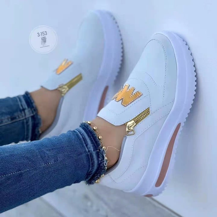Women's Slip-On Platform Sneakers with Side Decorative Zipper and Metallic Logo Application Mune Fashion