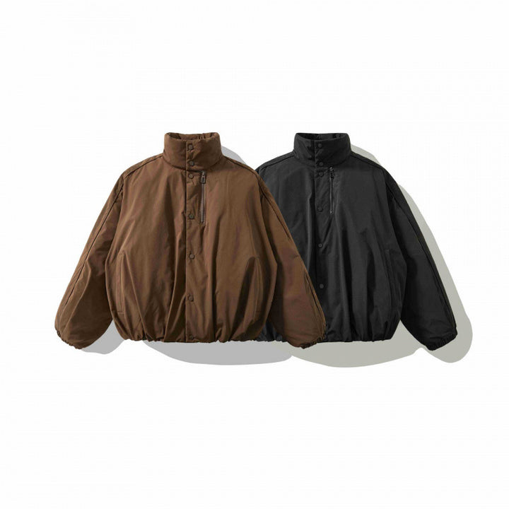 Unisex Oversized padded short jacket with high stand-up collar and elastic hems Mune Fashion
