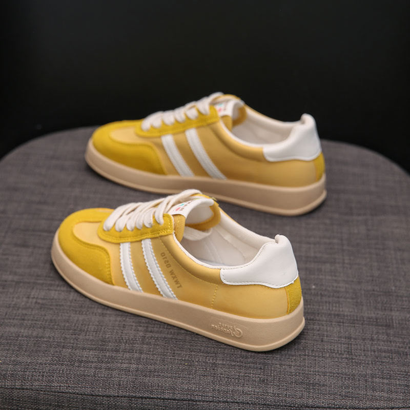 Ladies sporty sneakers with fashionable stripes and cushioned sole Mune Fashion