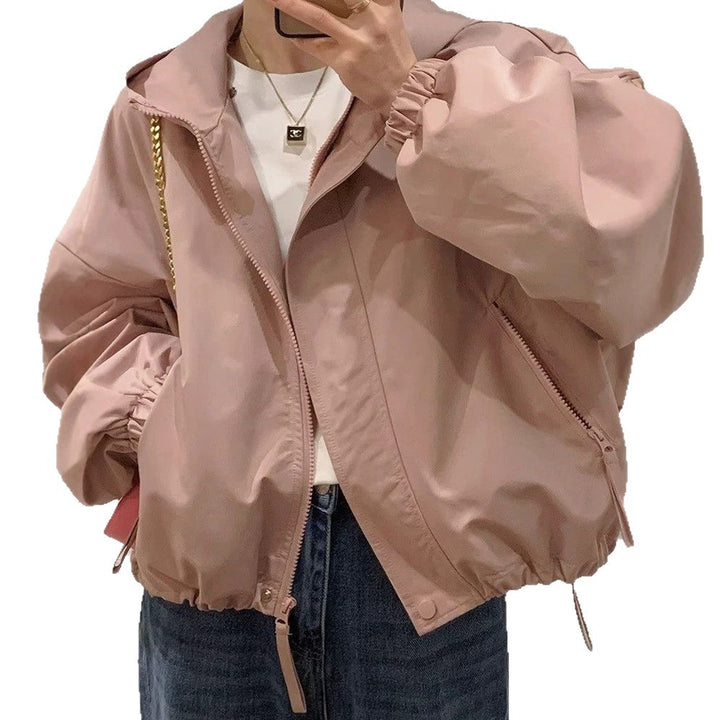 Women's oversized bomber-style hooded jacket with drawstring, elastic cuffs, and side zip pockets Mune Fashion