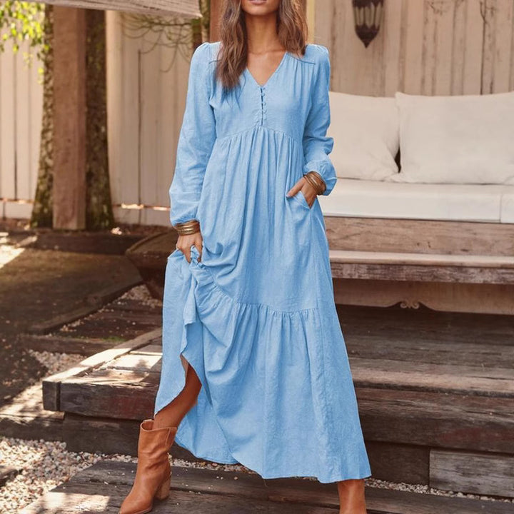 Women's airy maxi dress with V-neck, long sleeves, and side pockets Mune Fashion