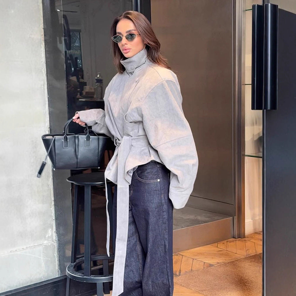 Women's short jacket made of faux suede with a high stand-up collar, waist belt, and boxy oversized silhouette Mune Fashion