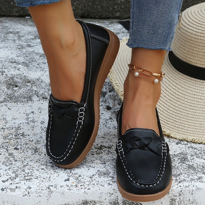 Ladies braided comfort moccasin with contrast stitching, padded memory insole, and flexible rubber profile Mune Fashion