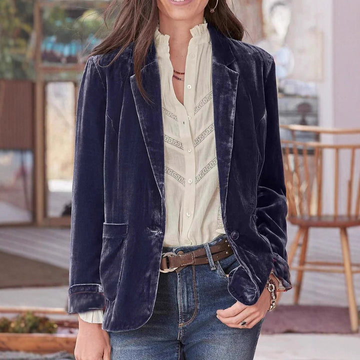 Women's velvet blazer with classic lapels and soft drape