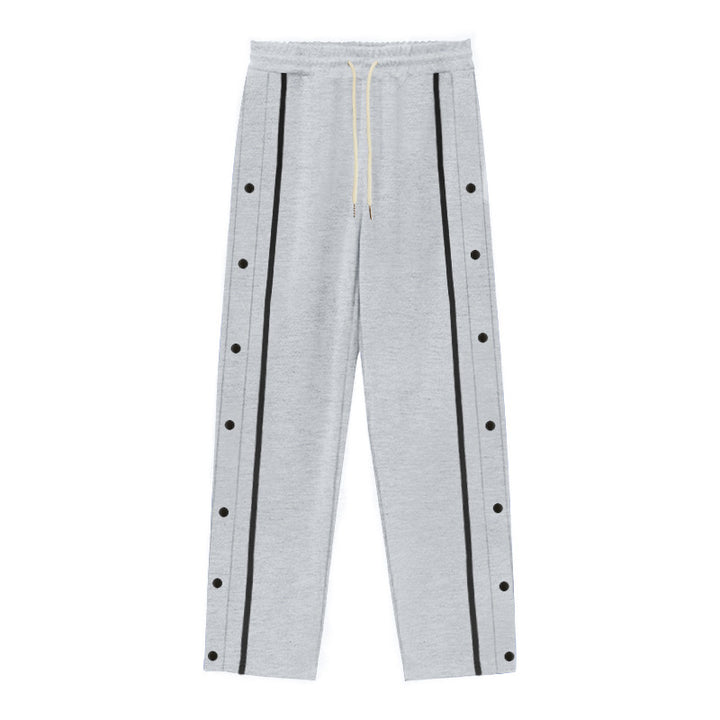 Men's Nan sporty jogging pants with side snap button placket, elastic drawstring waistband, and striking side stripes Mune Fashion