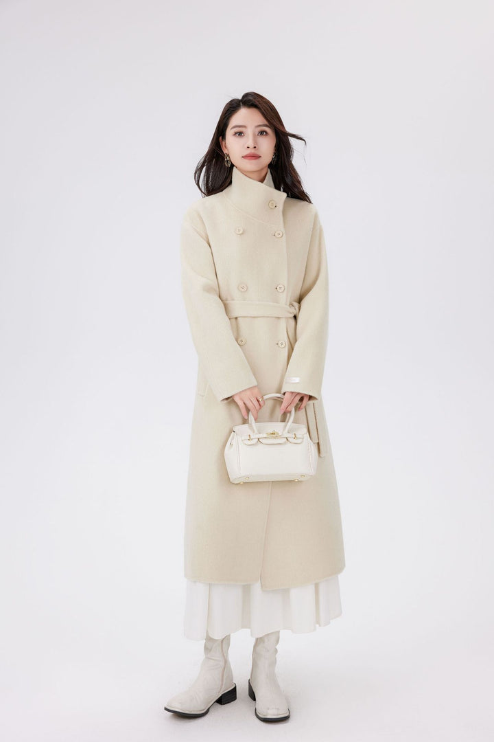 Women’s wool coat with double-breasted button placket, waist belt, and stand-up collar Mune Fashion