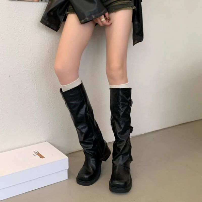 Women's knee-high slouch boots made of synthetic leather with adjustable buckles and textured platform heel Mune Fashion