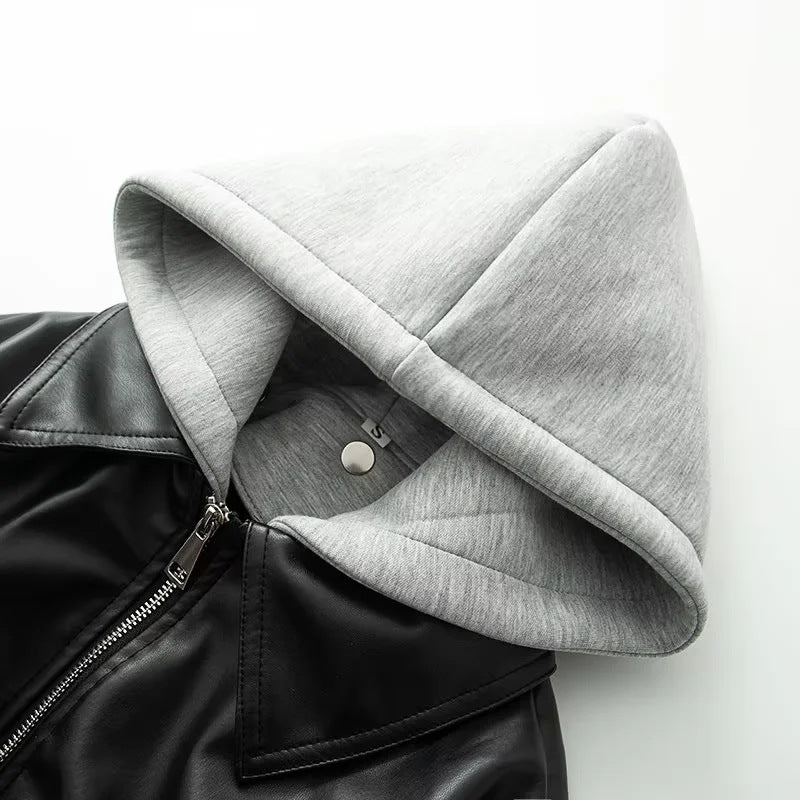 Women's oversized faux leather bomber jacket with integrated sweatshirt hood, full metal zipper, and flap pockets Mune Fashion