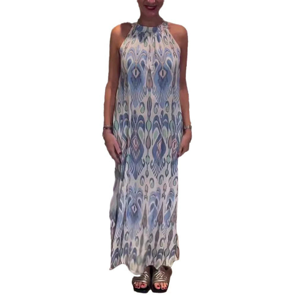 Women's flowing maxi dress with halter neck, ornamental ikat print and wide fall Mune Fashion