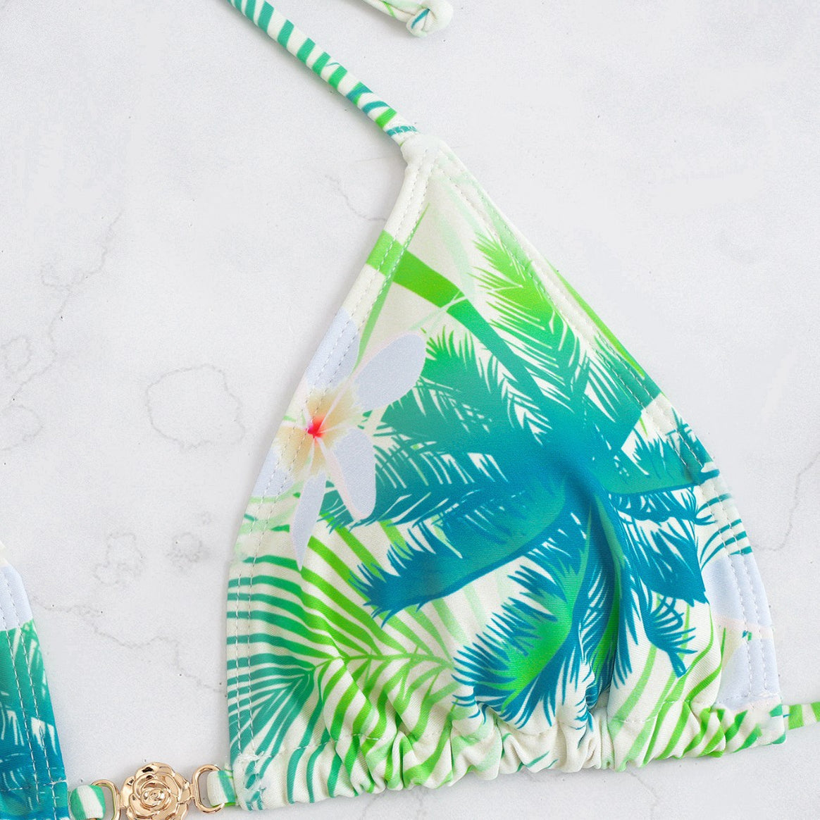 Ladies bikini set with elegant wrap skirt and tropical design Mune Fashion