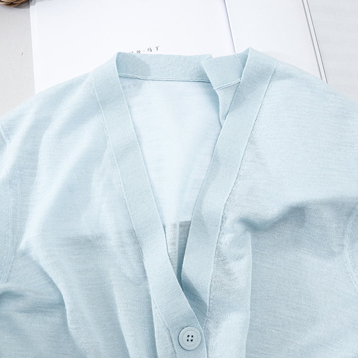 Women's Lightweight Oversized Cardigan made of fine knit with deep V-neck and decorative button placket Mune Fashion